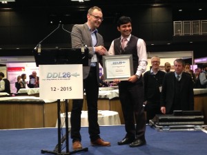 Darragh Murnane presents the Pat Burnell New Investigator Award to Sumit Arora